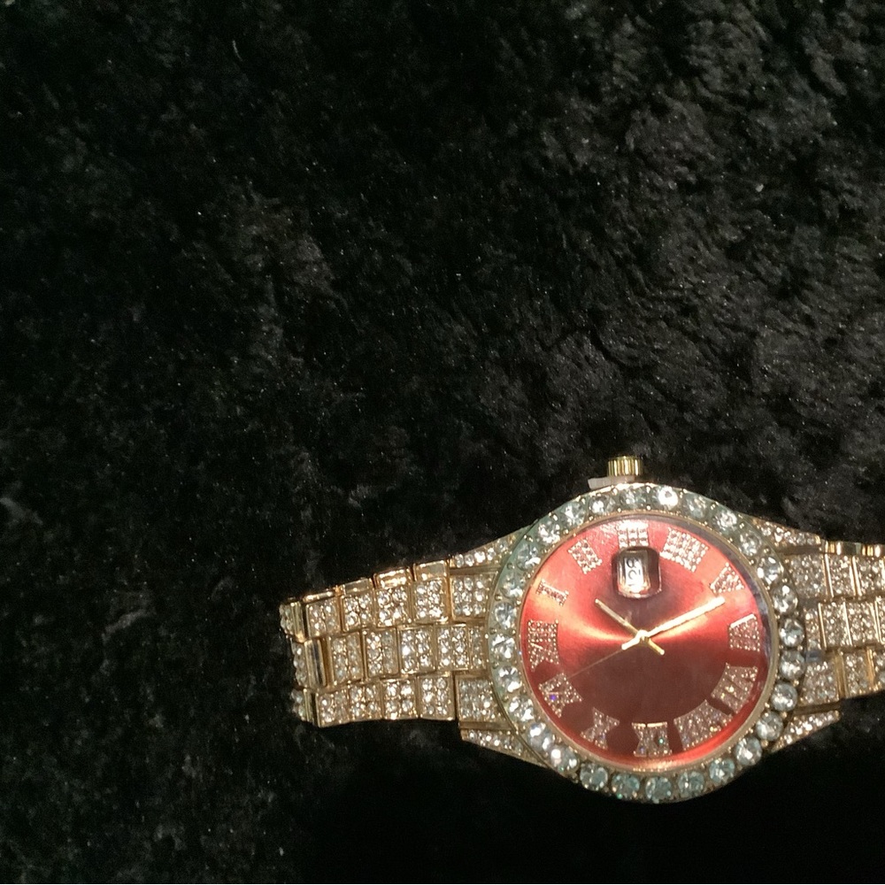 Elegant Red and Gold Watch with Jewel-Encrusted Band